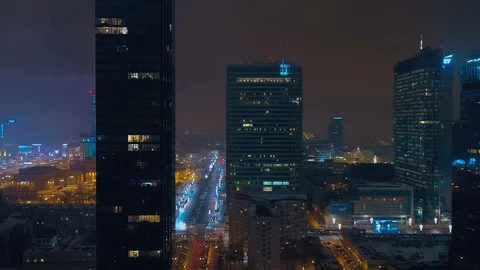 The drone passes past a glazed skyscraper. Stock Footage 108565363