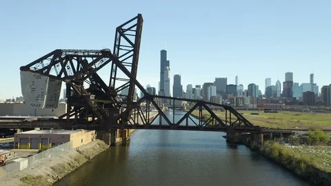Drone Passes through Bridge as it approaches Downtown Chicago [4K] Video stock 110545040