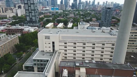 Drone passing close by buildings Stock Footage 171785428