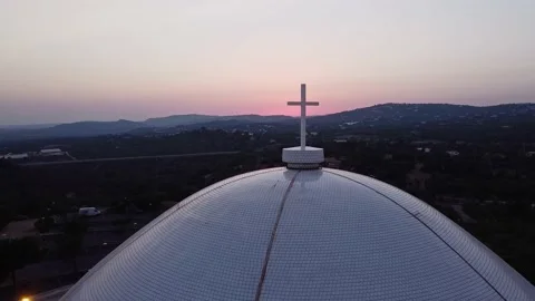 Drone passing cross at sunset Stock Footage 202591669