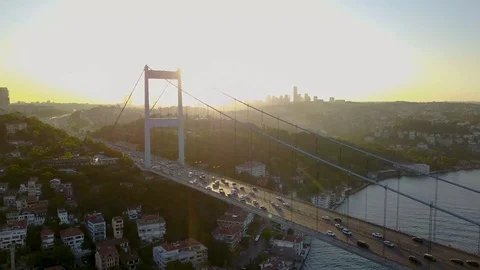 Drone passing over the Bosphorus bridge as sunsets down in Istanbul, oe01 Stock Footage 116815231