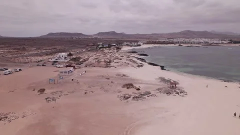 Drone Passing Over La Concha Beach and El Cotillo in Fuerteventura Stock Footage 309020707