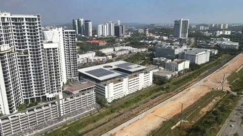Drone passing through 3rd Avenue and building in Cyberjaya Stock Footage 149380361