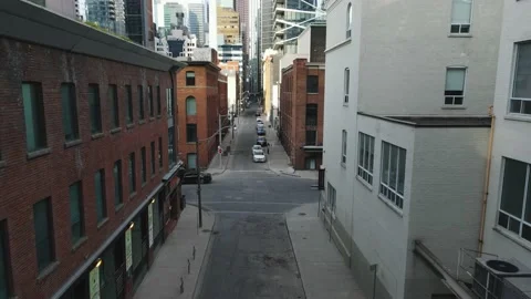 Drone passing through buildings Stock Footage 170945949