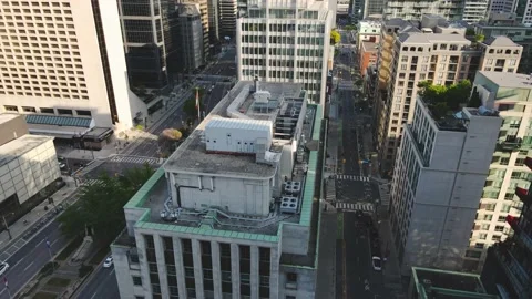 Drone passing through buildings Stock Footage 171785399