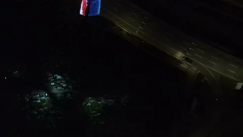 Drone passing through graveyard and bridge in Kampung Baru Stock Footage 150290815