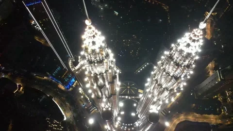 Drone passing through the highest Twin Tower in the World (Night view) Stock Footage 150290291