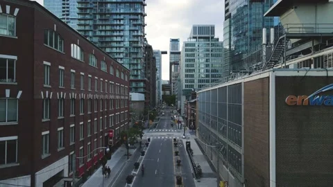 Drone passing through modern buildings Stock Footage 171785396