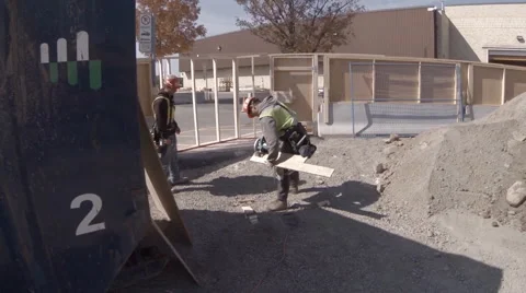 Drone Passing under Hydrolic Shovel Construction Site  Stock Footage 63883345