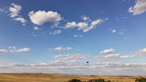 Drone Performing Aerobatic Maneuver Over Agricultural Landscape Stock Footage 346543503