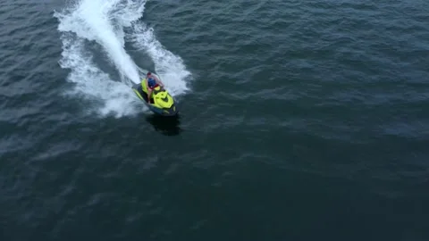 Drone: Person on Jet Ski Accelerates Quickly and Disappears Video stock 171651337