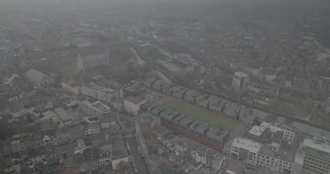 Drone Perspective Across the Rooftops of Ghent, Belgium Vídeo Stock 344128502