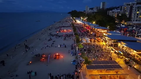 Drone perspective captures Batu Ferringhi fire show with radiant flames Stock Footage 332151492