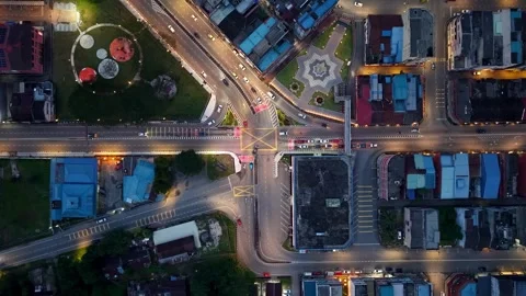 Drone perspective captures Kota Tinggi night traffic with illuminated roads 動画素材 329238622