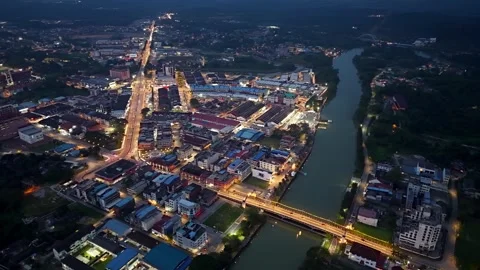 Drone perspective captures Kota Tinggi town beside Johor River Stock Footage 329368098