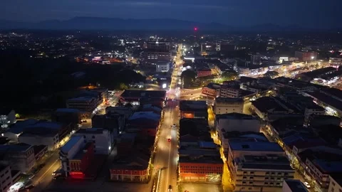 Drone perspective captures Kota Tinggi night traffic with glowing highways Stock-Footage 332144922