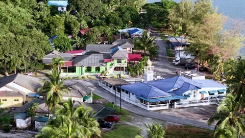 Drone perspective captures rural Johor Lama with scattered homes Video stock 332155853