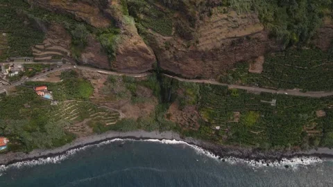 Drone perspective of Cascata dos Anjos waterfall cascading over textured rock Stock Footage 344316778