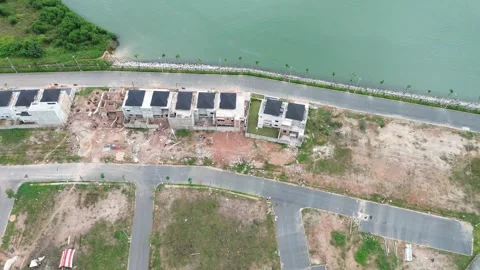 Drone Perspective of a Coastal Housing Development Project Near the coast Stock Footage 319608083
