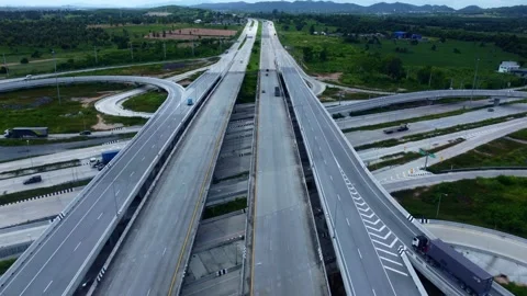 Drone perspective of an intricate highway junction showcasing layered road desig Video stock 335332526