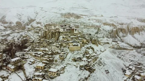 Drone perspective of Lamayuru Monastery and village during a winter snowstorm. Stock Footage 310661137