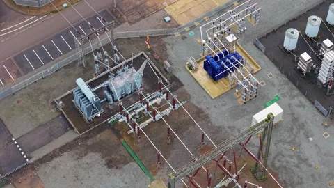Drone perspective of a massive high voltage electricity distribution hub and Stock Footage 336711199