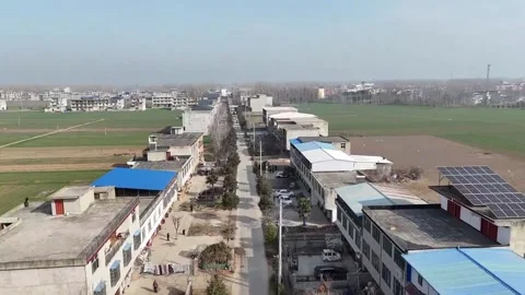 Drone Perspective of Rural Road Infrastructure and Housing in China Stock Footage 333285715