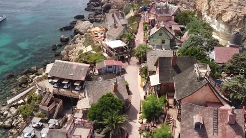 Drone perspective of a theme park village near sea. Stock Footage 163538170