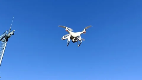 Drone Phantom 3 flies in the blue sky Video stock 163813276