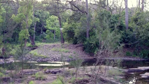 Drone Phantom 4 flying above country creek Stock Footage 74604070