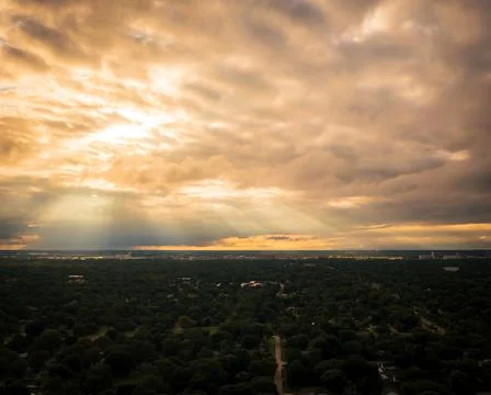Drone photo of sun rays through clouds in Wichita Kansas at sunrise Stock Photos