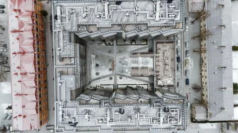 Drone photography top down view of residential building covered by snow dur.. Stock Photos