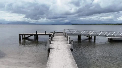 Drone on a pier, without boats, with the image approaching the building Stock Footage 306312737