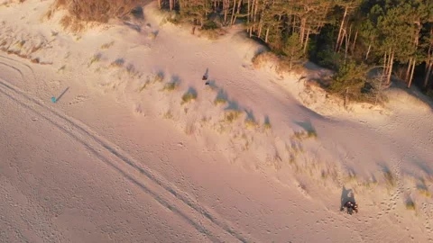 Drone pilot on the beach - Baltic Sea Drone Video Stock Footage 130224019