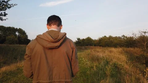 Drone Pilot flying his drone close to him 스톡 동영상 114625737