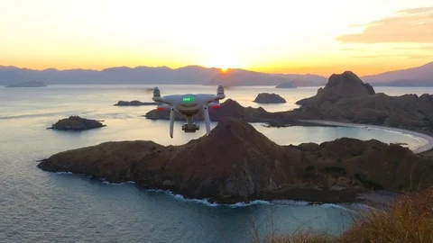 Drone pilot with high resolution camera flying Stock Footage 84812612