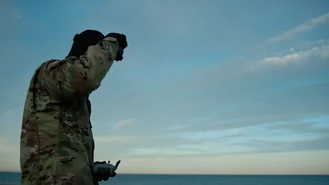 Drone pilot soldier points to the target Stock Footage 272984391