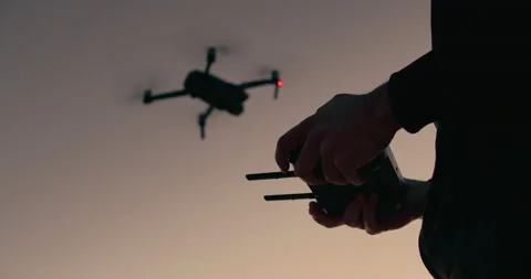 Drone pilot, video blogger control drone on remote Video stock 148037145