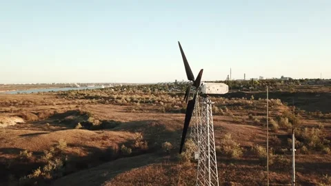 Drone point of view aerial fly near the vane of wind generator Stock Footage 143559081