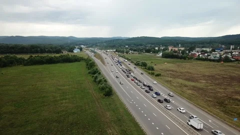 Drone Point of view - aerial view of rush hour traffic jam highway. Stock Footage 112659181