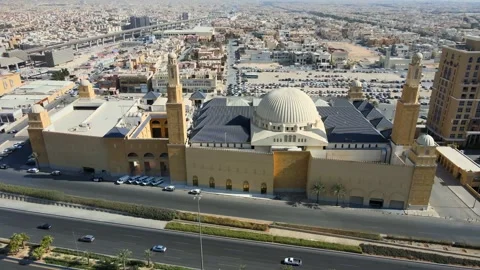 A drone point of view of Al Rajhi Mosque, Riyadh Mero line and Eastern Ring Road Stock Footage 296338124