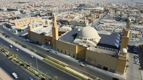 A drone point of view of Al Rajhi Mosque, Riyadh Mero line and Eastern Ring Road Stock Footage 296339372