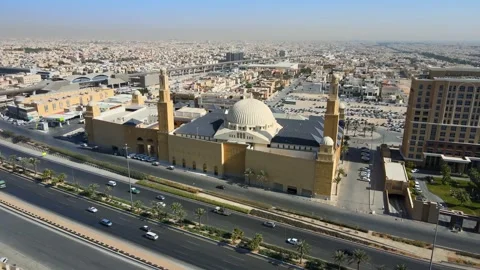 A drone point of view of Al Rajhi Mosque, Riyadh Mero line and Eastern Ring Road Stock Footage 296339433