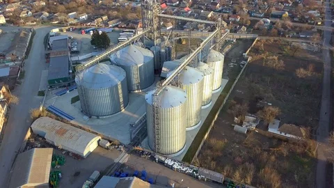 Drone point of view around wheat granary Stock Footage 130025435