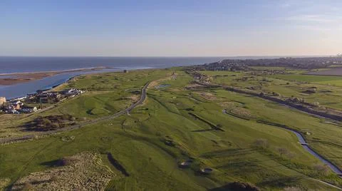 Drone point of view of a golf course by the coast in Felixstowe, Suffolk, UK Фото