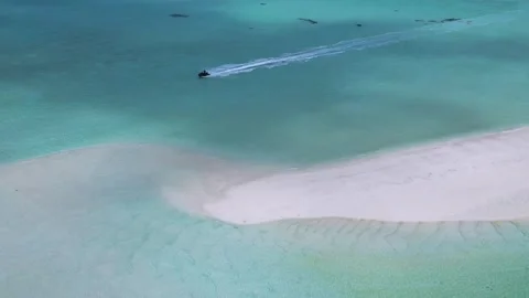 Drone point view at jet ski in the sea near sandbank Stock Footage 305913665