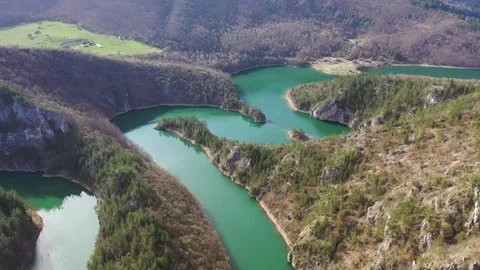 Drone point of view of mountain river meanders Stock Footage 271672070