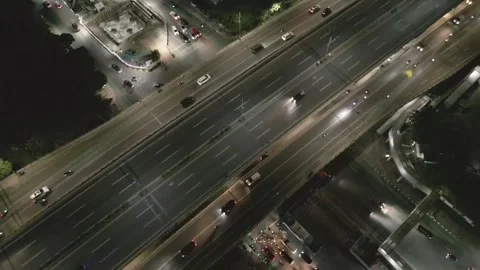 Drone Point View of Overpass and City Traffic at night Stock Footage 296581066