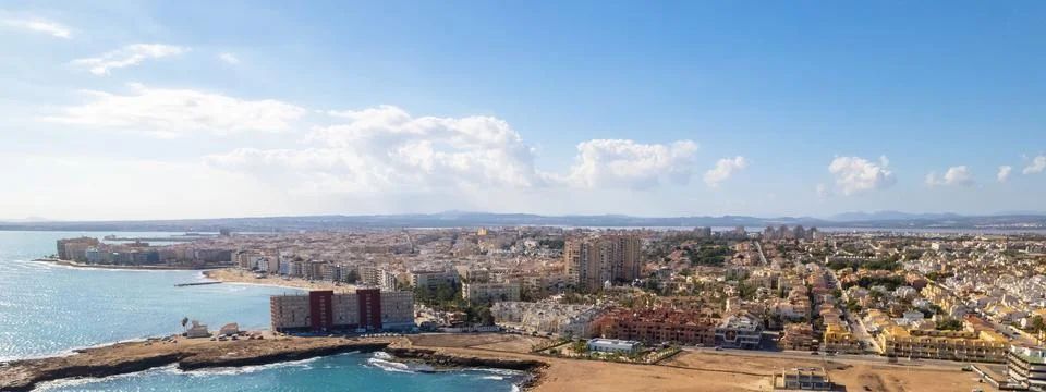 Drone point of view panoramic image of Torrevieja cityscape. Blue Mediterrane Stock Photos