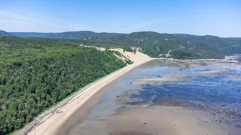 Drone point of view of sand dunes in Tadoussac, Quebec, Canada. View from o.. Stock Photos